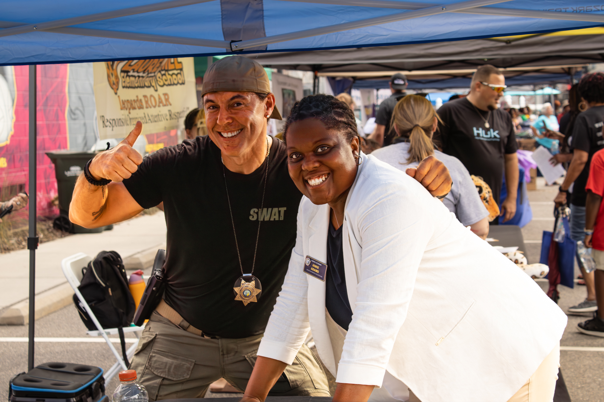 Jamie Adams with Detective Earl Haywood at the Scotland County stop the violence event